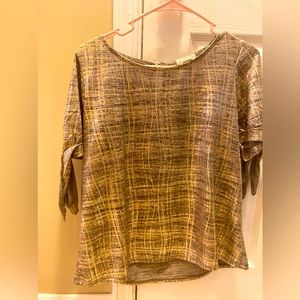 Fancy top that glimmers.